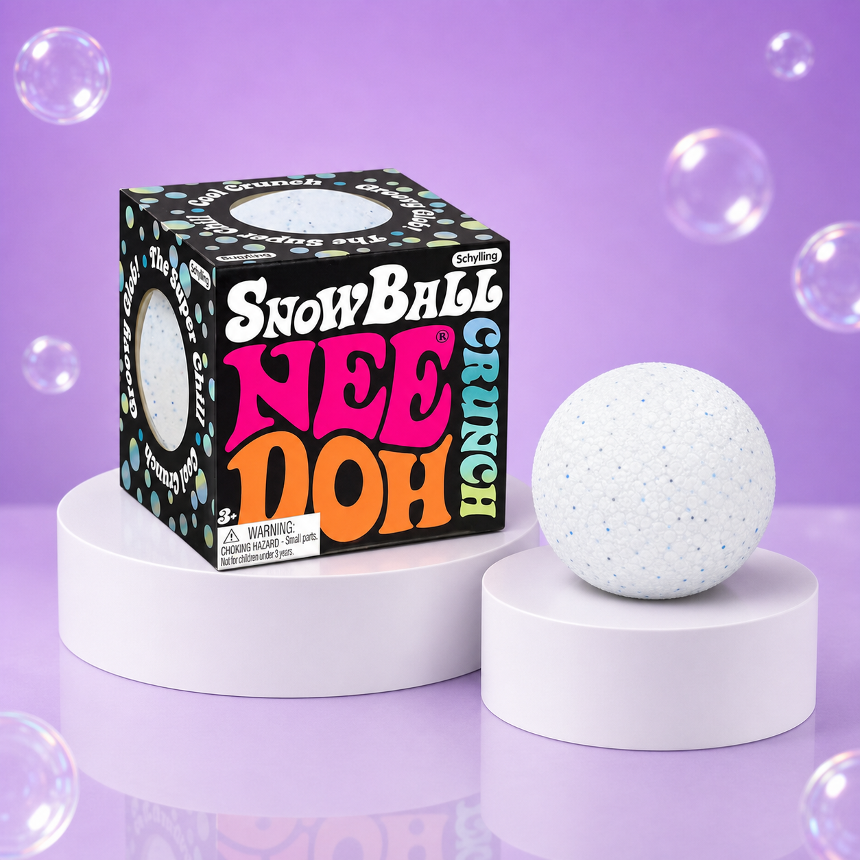 NeeDoh Snowball Crunch package with a white textured snowball squishy on white podiums.
