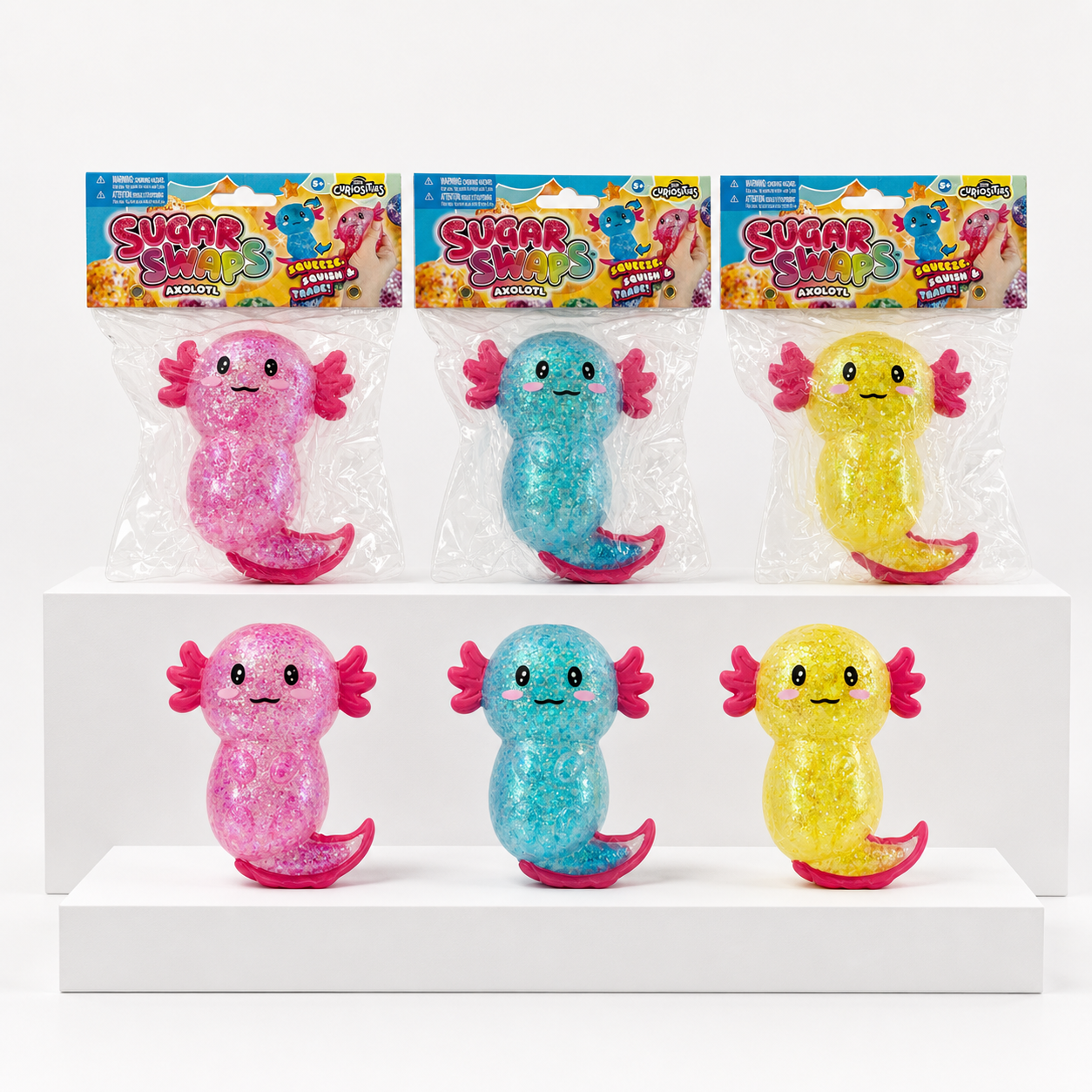 ORB Sugar Swaps Axolotl pink, blue, and yellow packaged variants with matching loose products