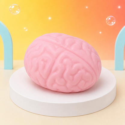 Top three-quarter view of the pink ORB Jumbo Brainy squishy on a white podium