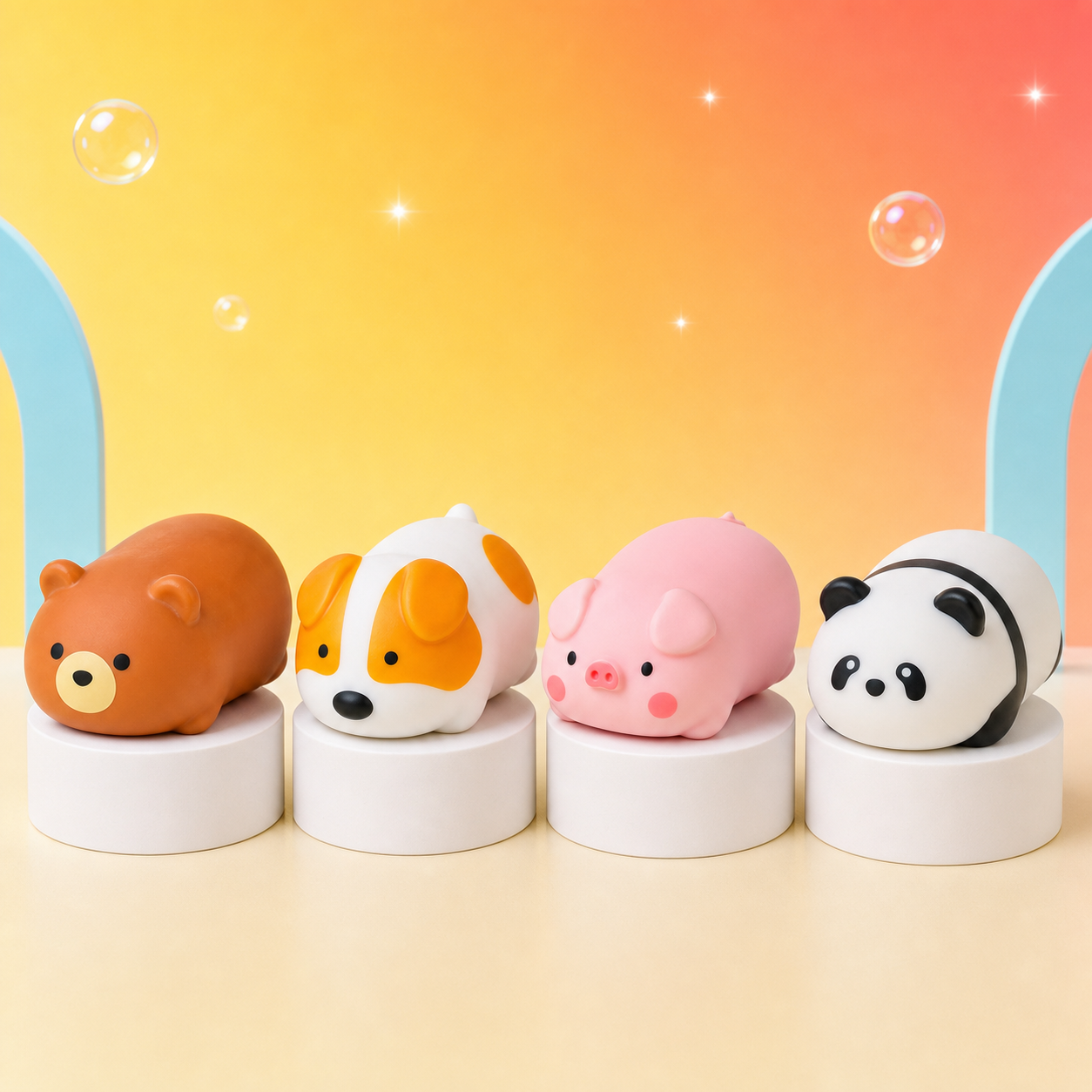 Four ORB Easy Sqweezy Snugglies animal squishies in a straight white-podium lineup