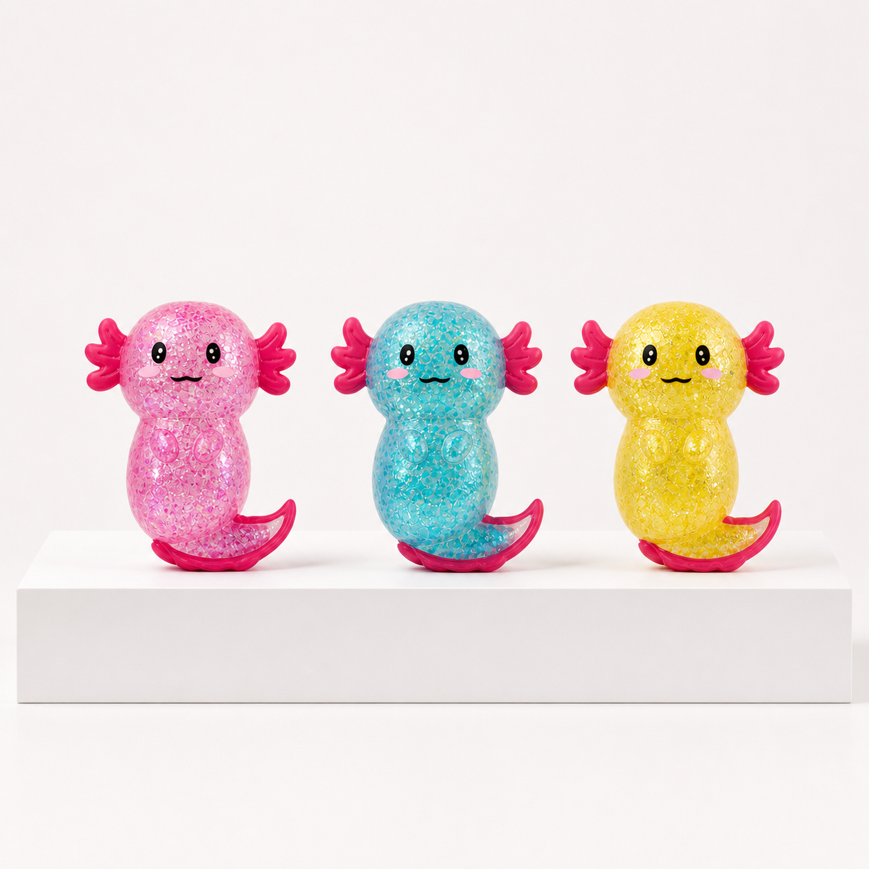 ORB Sugar Swaps Axolotl loose products in pink, blue, and yellow
