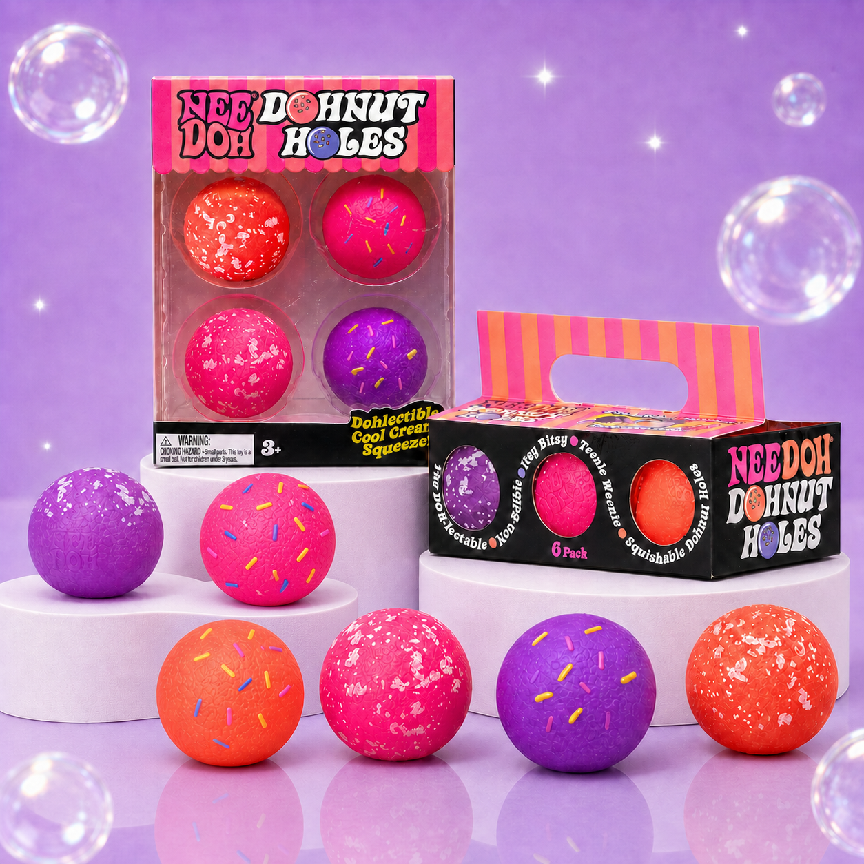 NeeDoh Dohnut Holes 4-pack and 6-pack with six pink, purple, and orange squishy balls on white podiums.