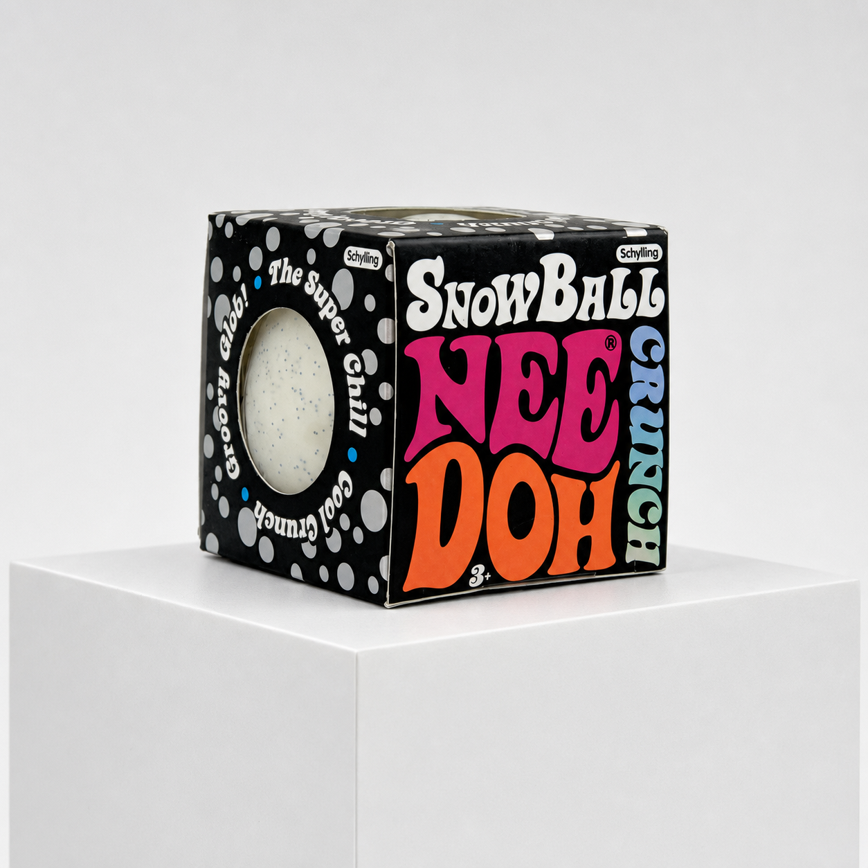 NeeDoh Snowball Crunch retail package on a white rectangular podium
