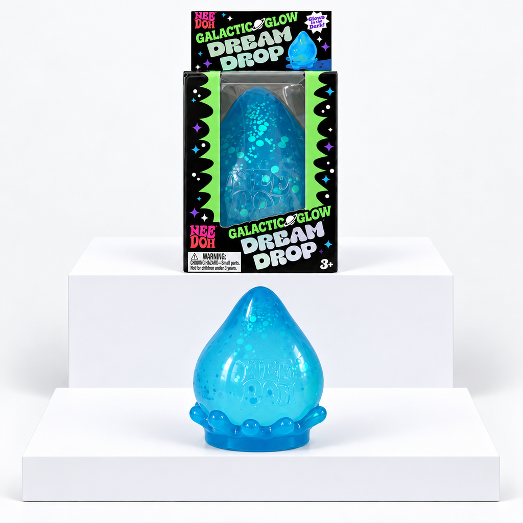 Blue NeeDoh Galactic Glow Dream Drop toy in front of its box on white display blocks