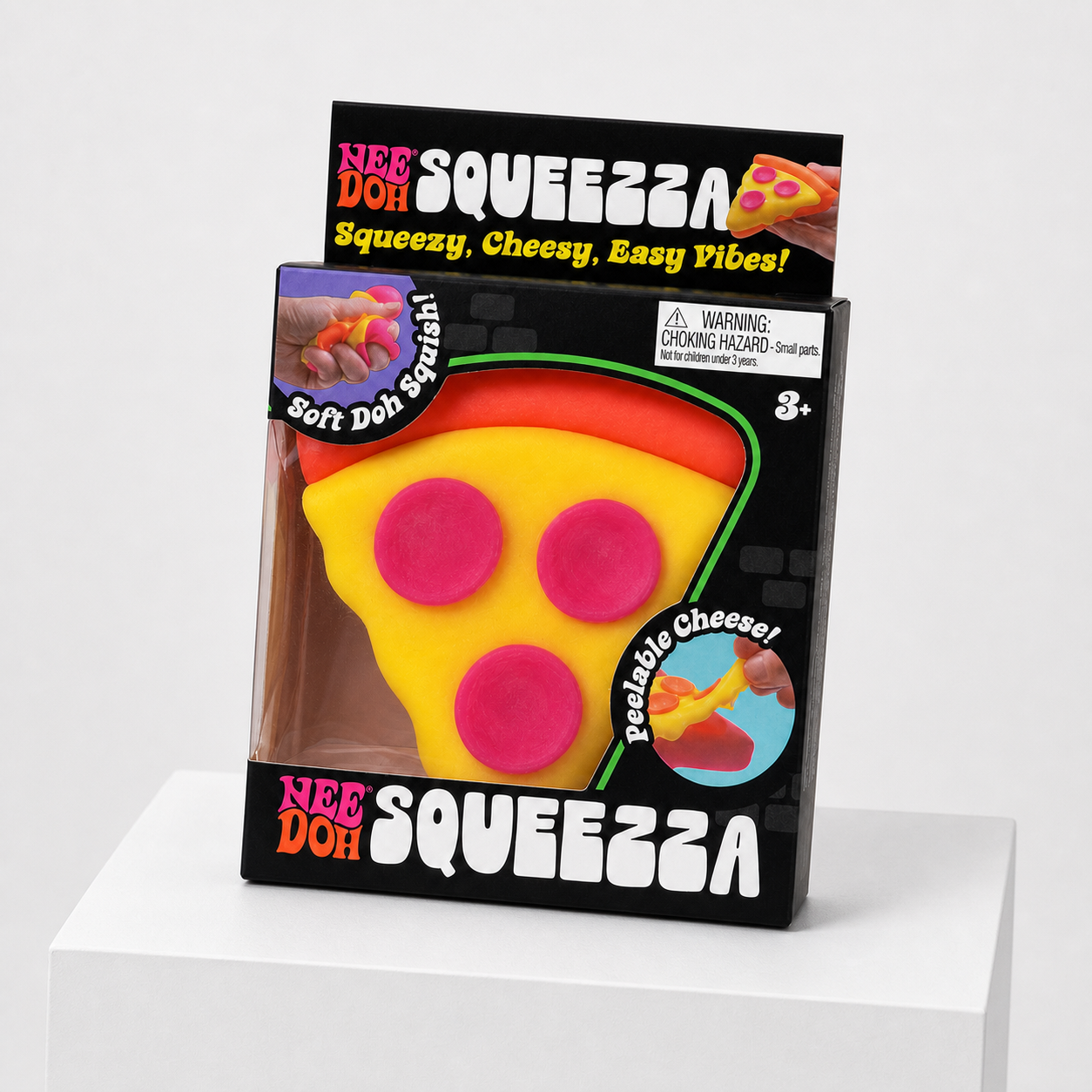 NeeDoh Squeeza Pizza yellow body and orange-red crust retail package tilted on a white rectangular podium