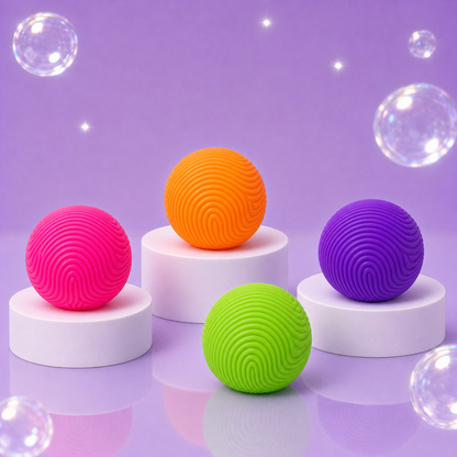 Purple, orange, green, and pink NeeDoh Super Ripples textured fidget balls on white podiums.