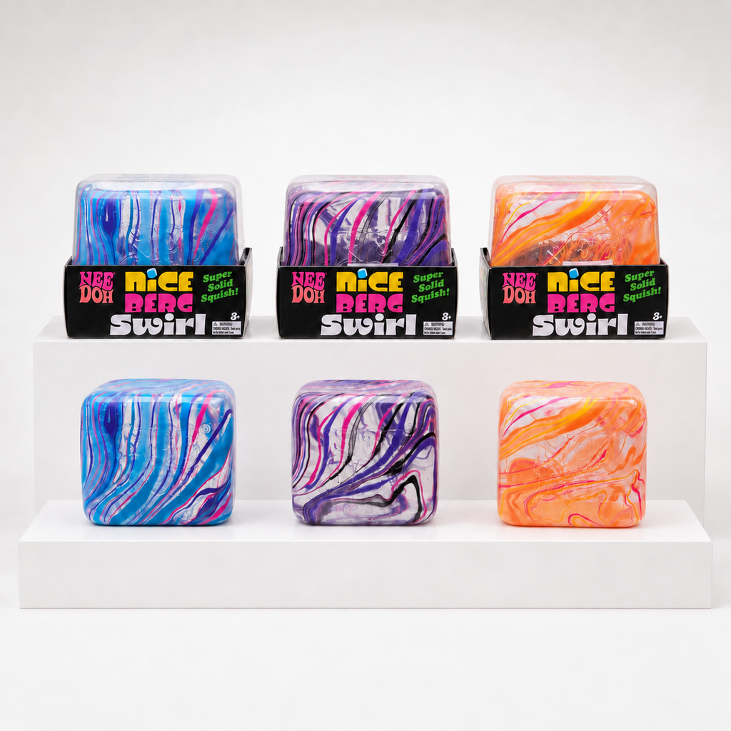 Three marbled NeeDoh Nice Berg Swirl cubes pictured with their display boxes