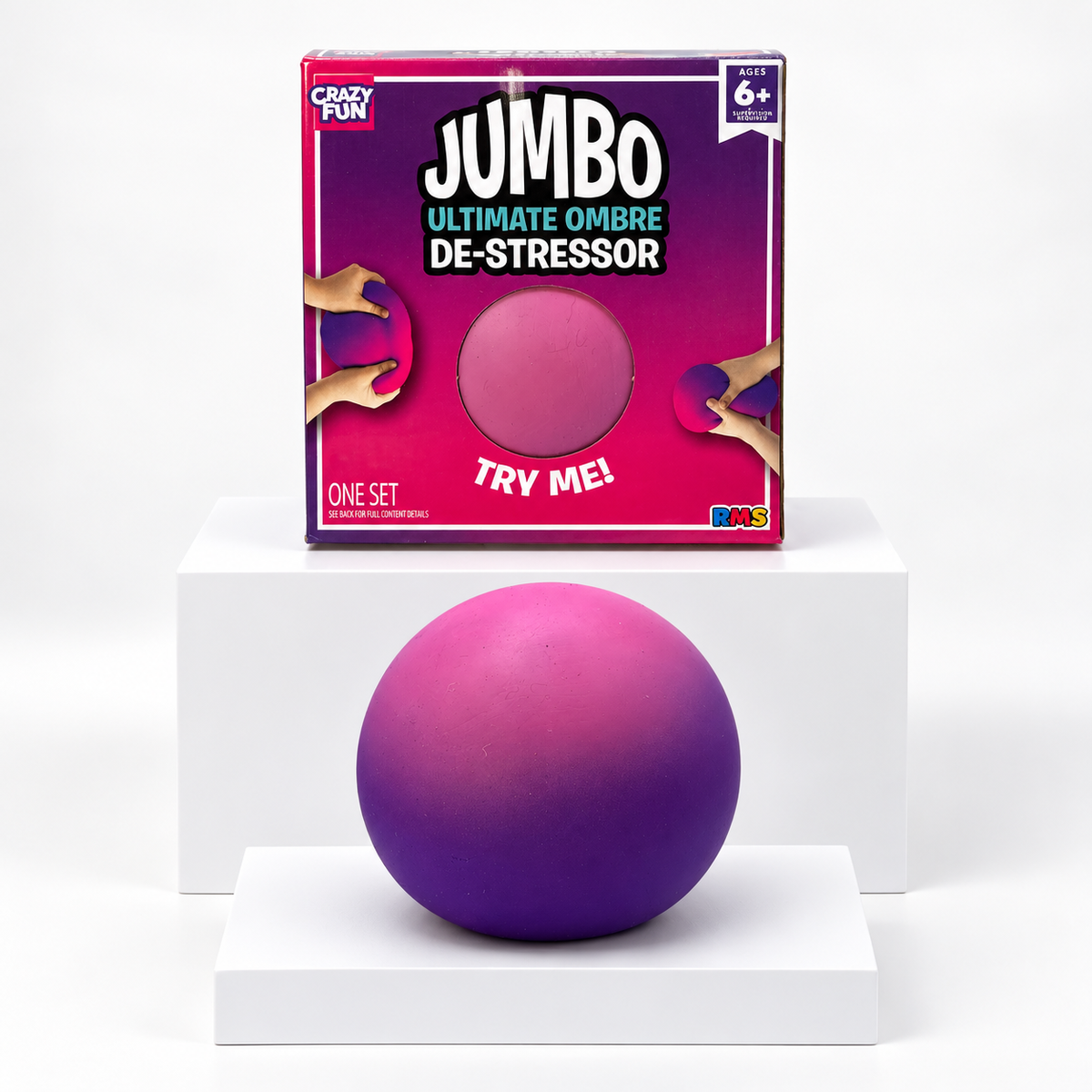 Purple-pink jumbo squishy ball in front of its Crazy Fun retail box