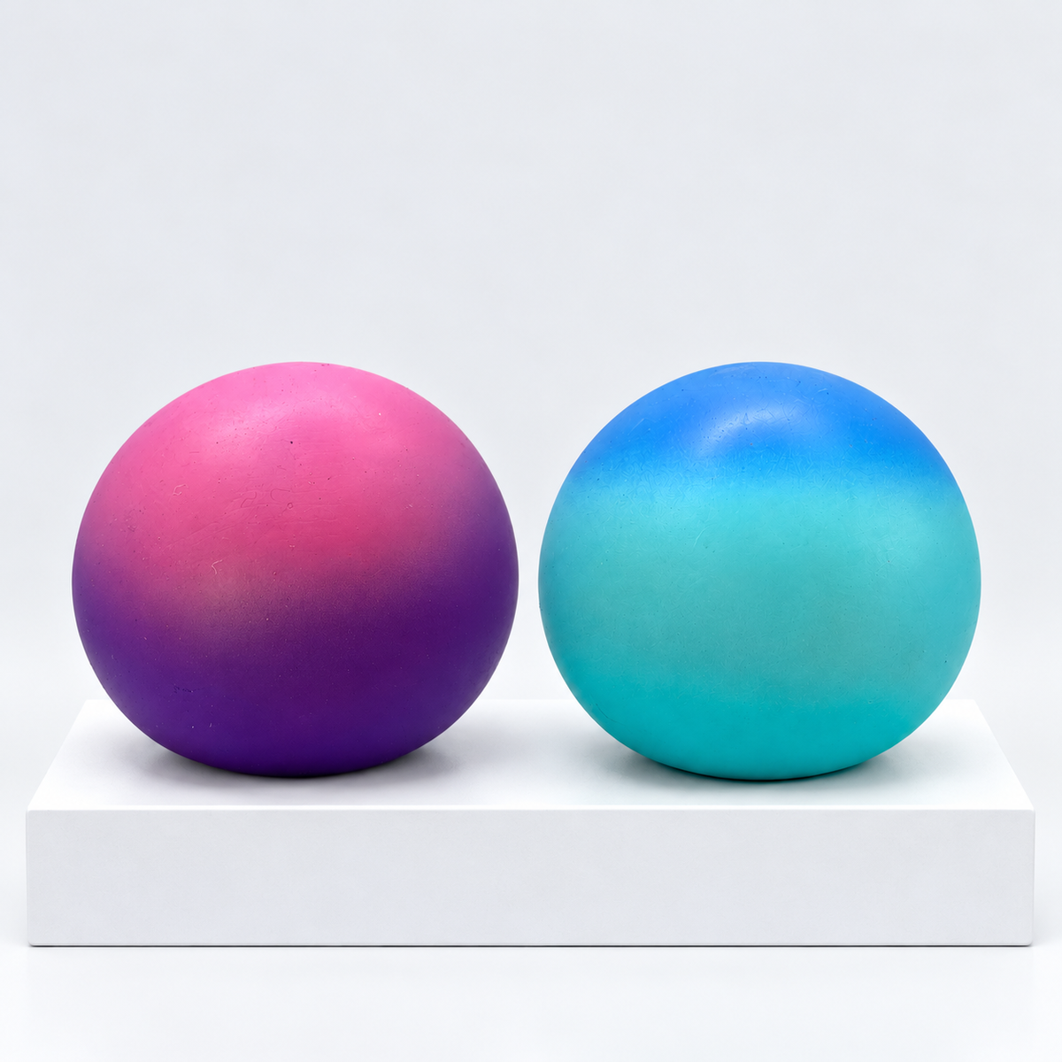 Purple-pink and blue-green jumbo squishy balls without boxes