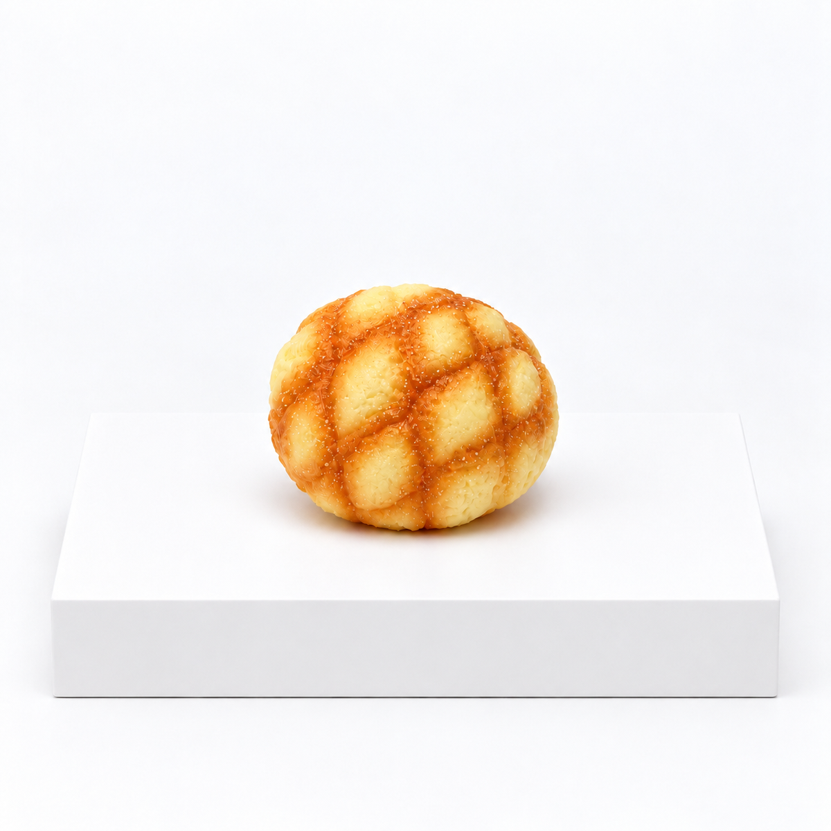 Round golden-brown bread-shaped squishy viewed from the front