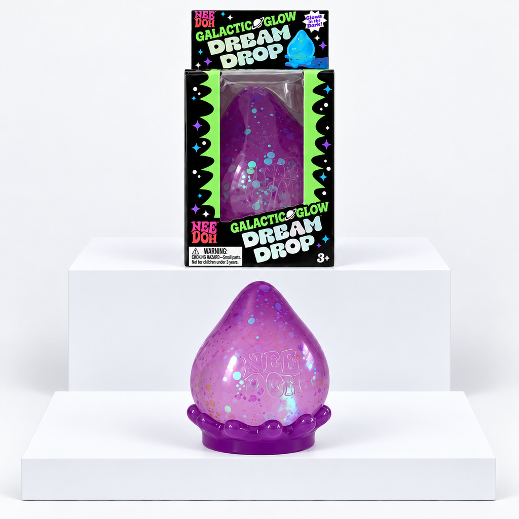 Purple NeeDoh Galactic Glow Dream Drop toy in front of its box on white display blocks