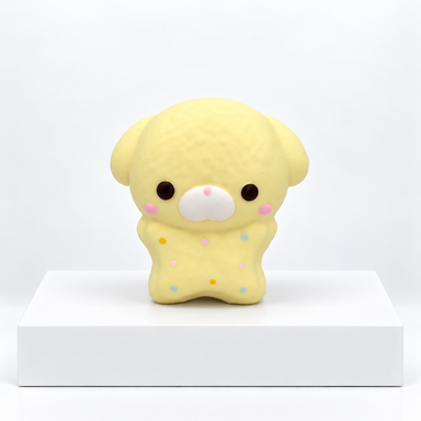 Yellow Nunu puppy character with floppy ears, unboxed front view