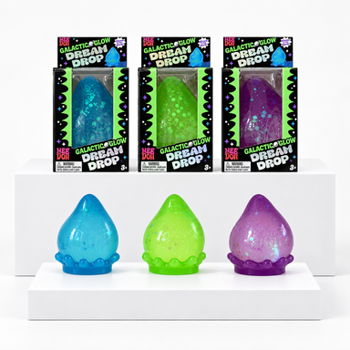 Blue, green and purple NeeDoh Galactic Glow Dream Drop toys below their boxes on white display blocks