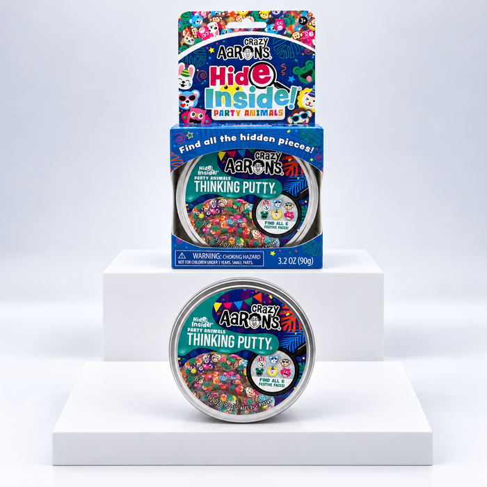 Crazy Aaron's Hide Inside Party Animals Thinking Putty tin and blue display box, front view