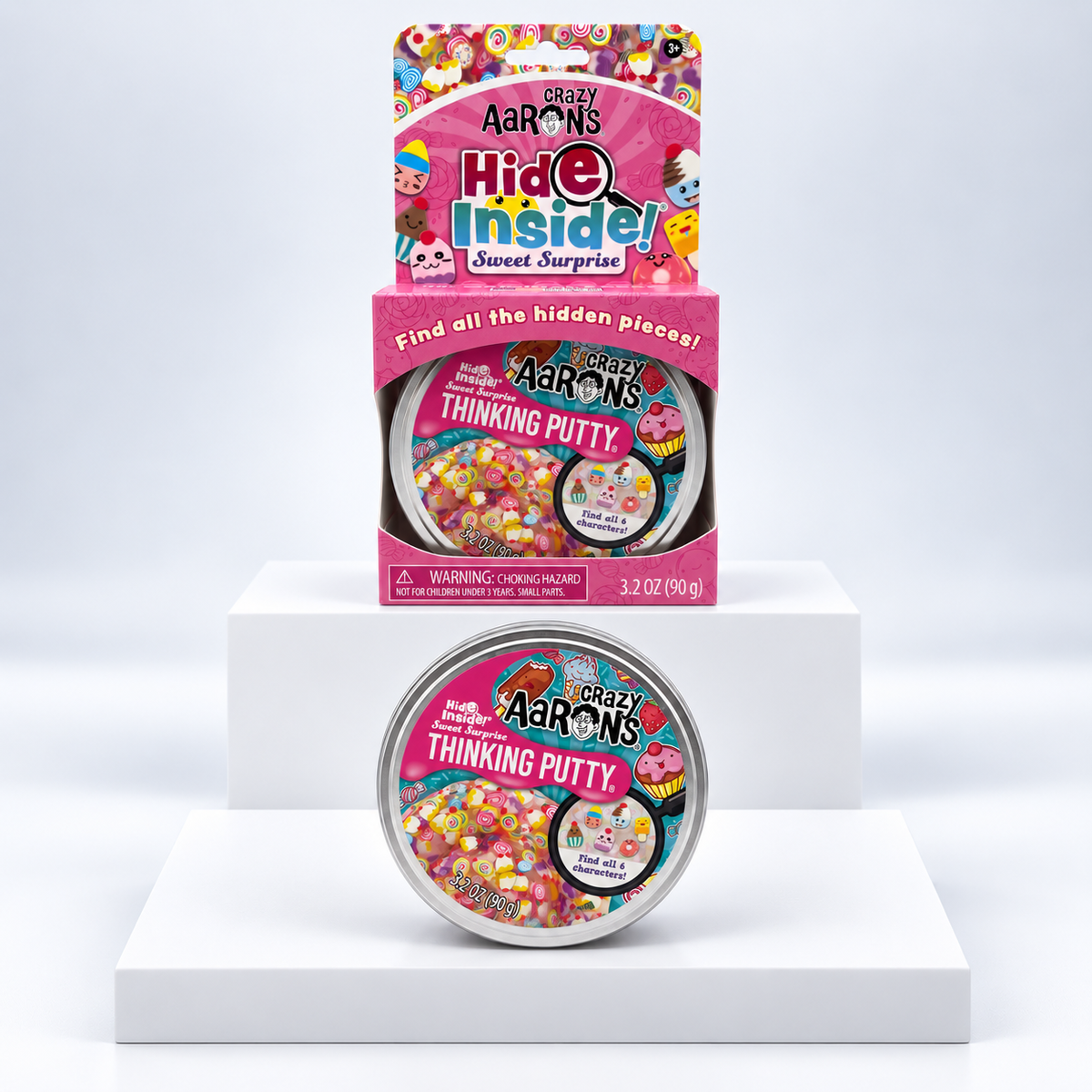 Crazy Aaron's Hide Inside Sweet Surprise Thinking Putty tin and pink display box, front view