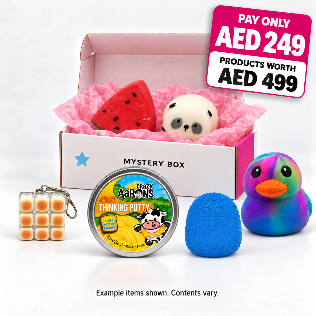 Squish Planet AED 249 Mystery Box with example squishy toys and putty; contents vary