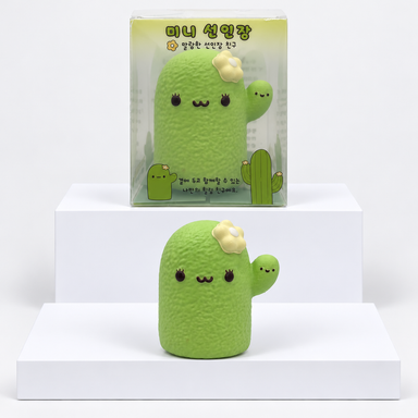 Green Nunu cactus character with yellow flower pictured beneath its box