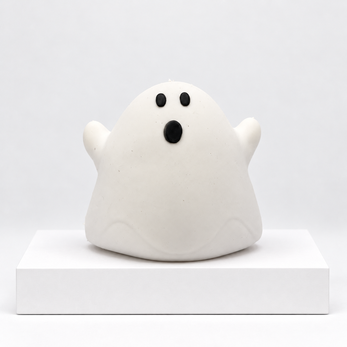 White ghost-shaped Squeeezy squishy toy, unboxed front view