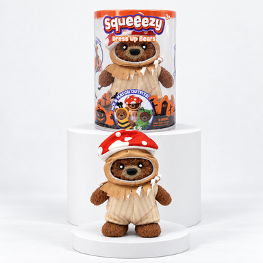 Squeeezy brown bear in red mushroom hat beneath its package