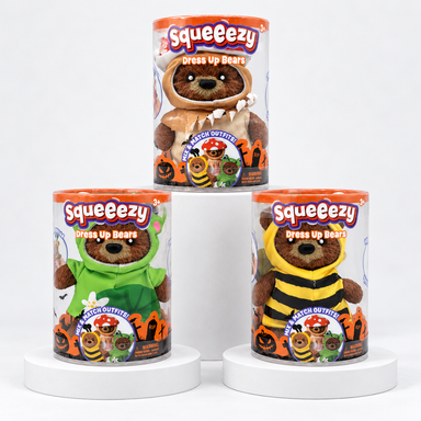 Three packaged Squeeezy costume bears in mushroom, frog and bee outfits