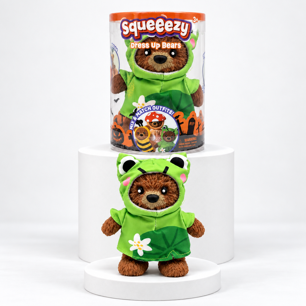 Squeeezy brown bear in green frog outfit beneath its package