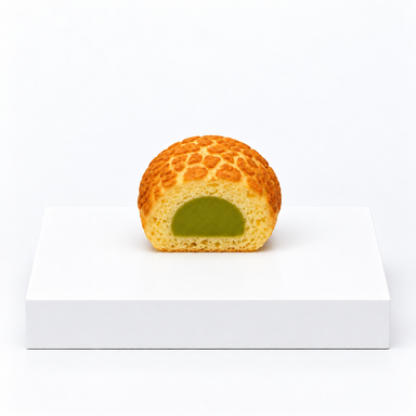 Cut-open bread-shaped squishy showing a green center