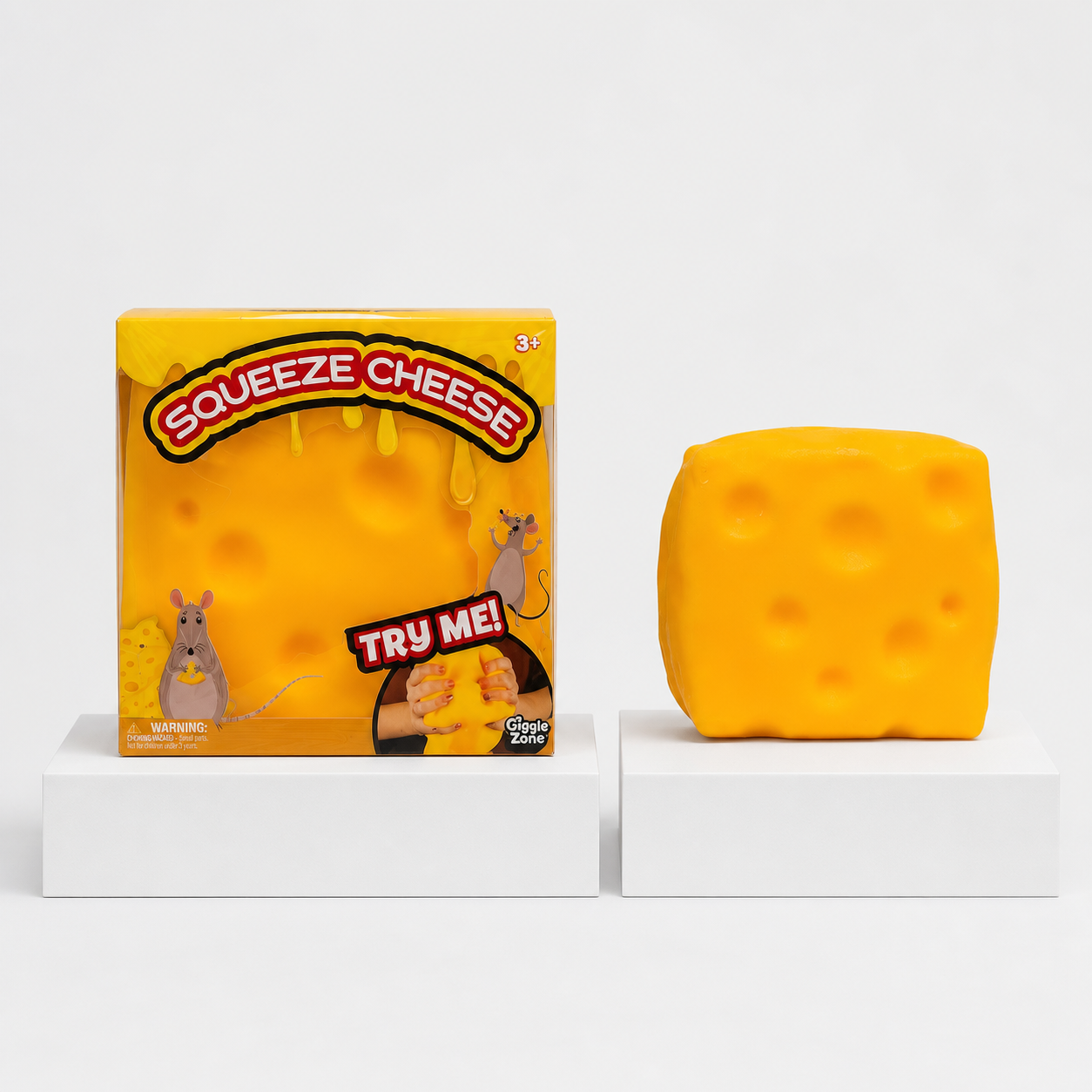 Giggle Zone Squeeze Cheese package and cheese squeeze fidget toy