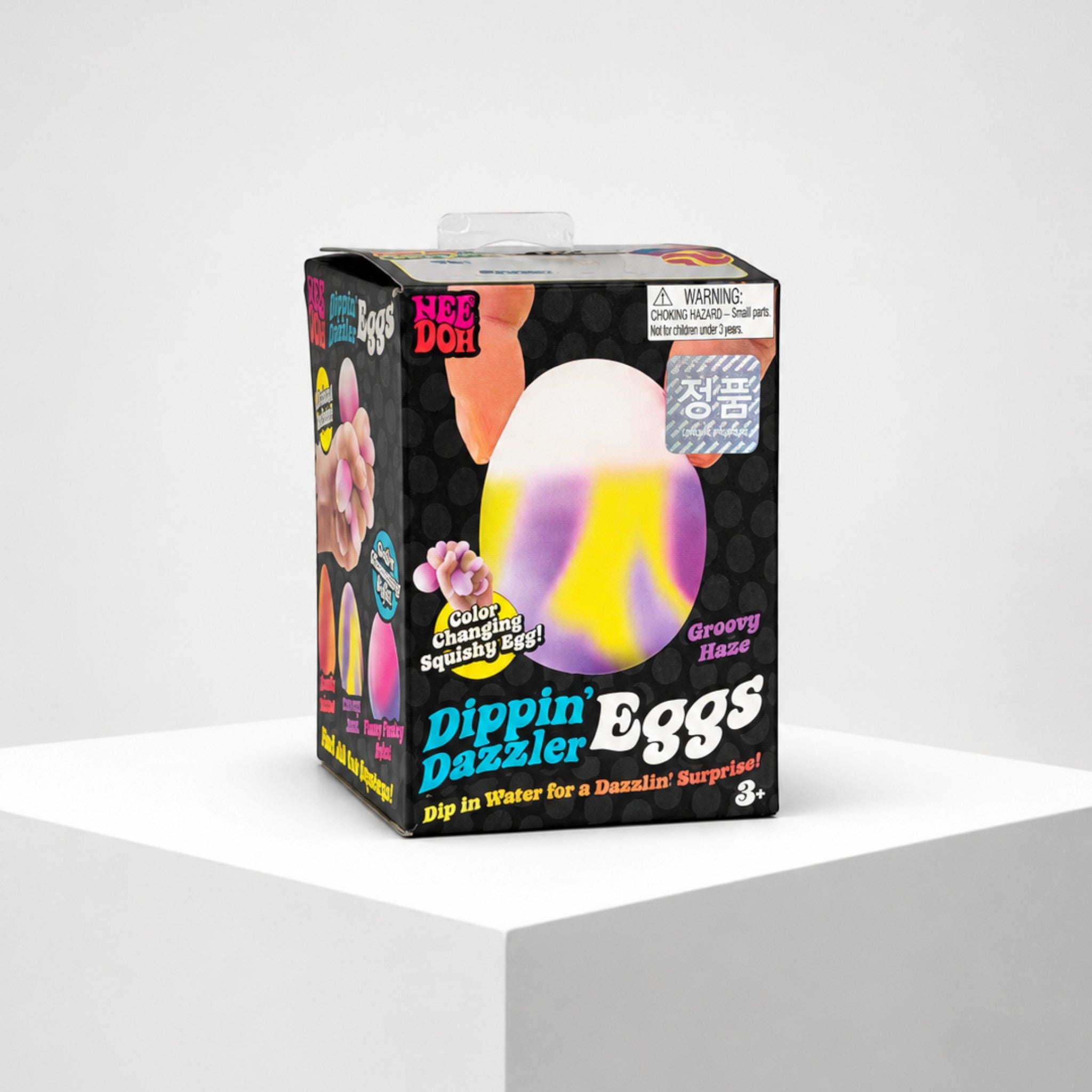 Squish Planet NeeDoh Dippin Dazzler Egg fidget toy in its colorful Groovy Haze packaging box