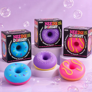Squish Planet NeeDoh Dohnuts squishy fidget toys in blue, purple, and pink with colorful frosting and sprinkles.