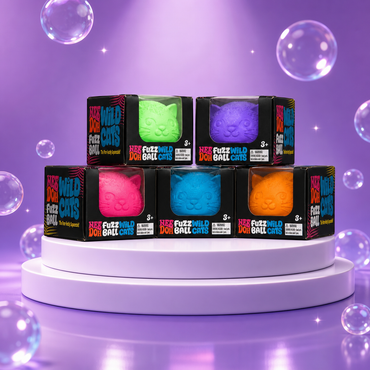 NeeDoh Fuzz Ball Wild Cats squishy fidget toy assortment on a Squish Planet purple display.