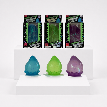 NeeDoh Galactic Glow Dream Drop packages with blue, green, and purple glow squishy variants