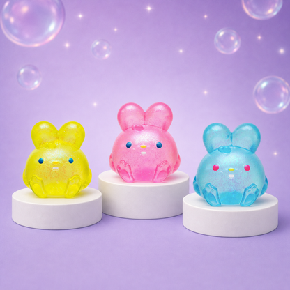 NeeDoh Jelly Hops translucent glitter bunnies in yellow pink and blue