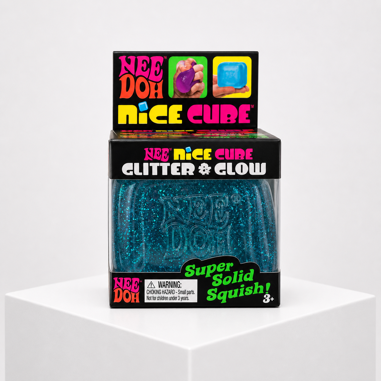 NeeDoh Nice Cube Glitter and Glow blue glitter squishy fidget toy in retail packaging, front view.
