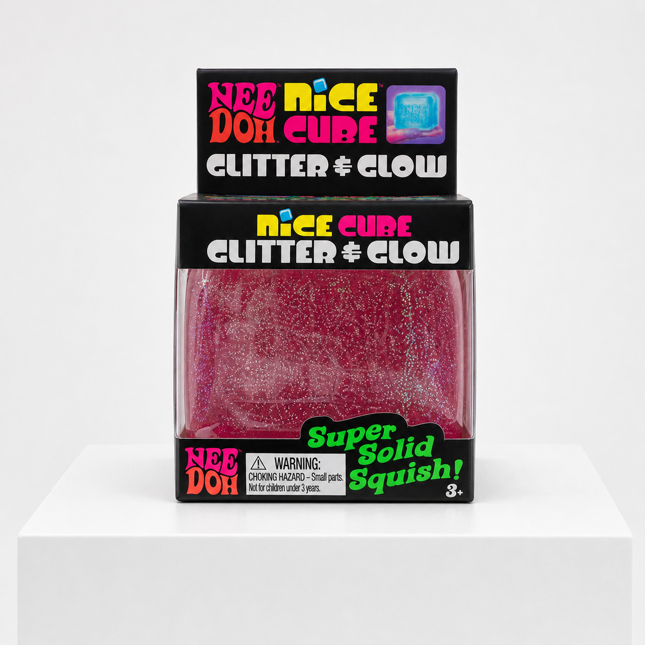 NeeDoh Nice Cube Glitter and Glow pink glitter squishy fidget toy in retail packaging, front view.