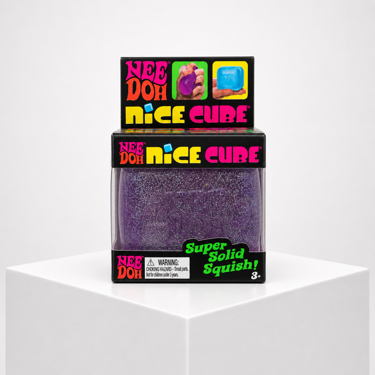 NeeDoh Nice Cube Glitter and Glow purple glitter squishy fidget toy in retail packaging, front view.