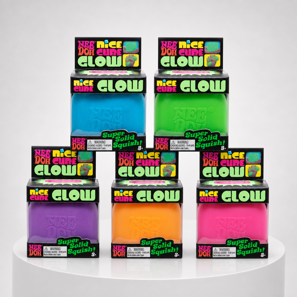 NeeDoh Nice Cube Glow five-color assortment in retail packaging, official-style front group view.
