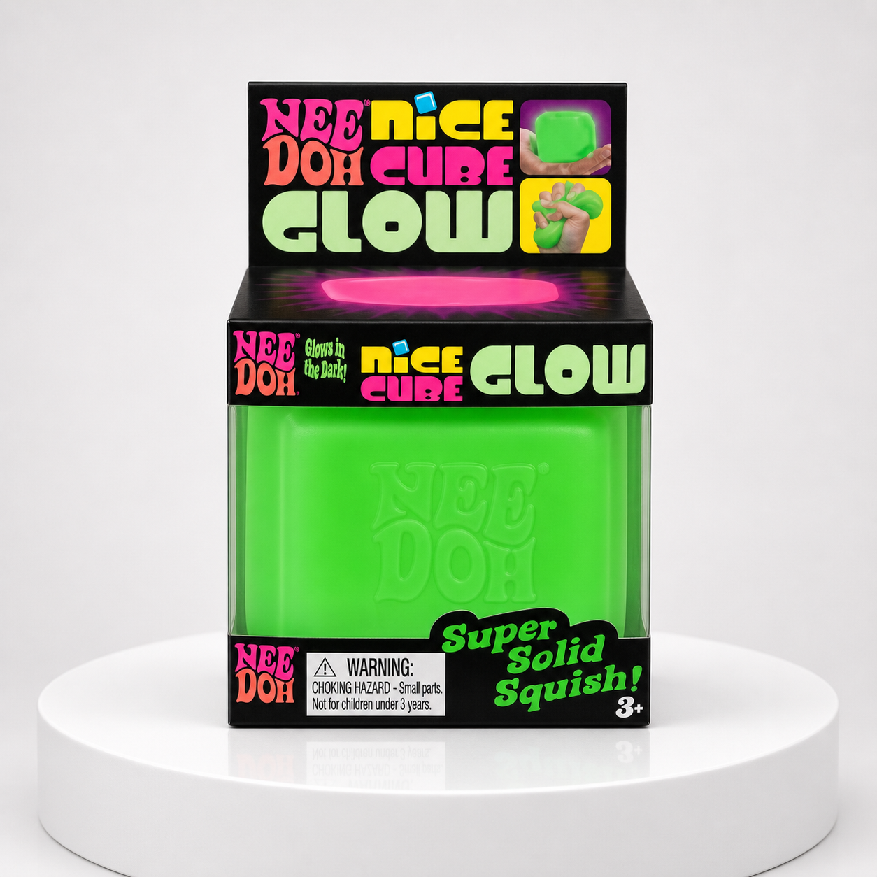 NeeDoh Nice Cube Glow green squishy fidget toy in retail packaging, front view.