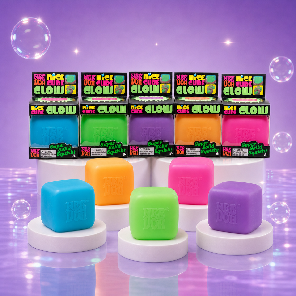 NeeDoh Nice Cube Glow packaging with blue, green, purple, yellow, and pink squishy cubes on a Squish Planet purple display.