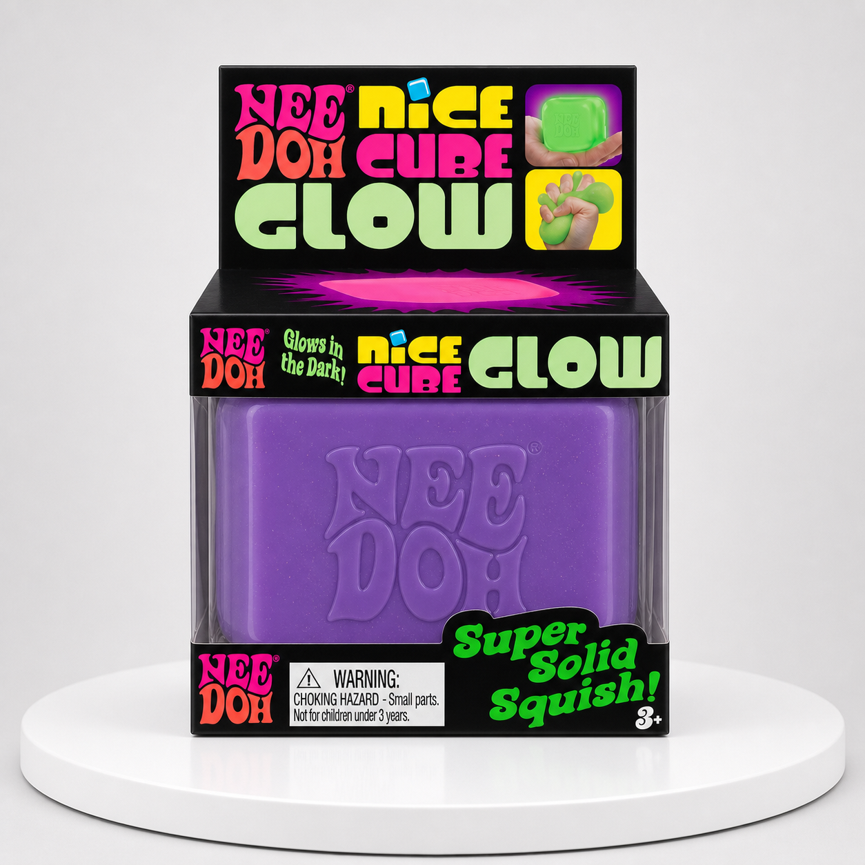 NeeDoh Nice Cube Glow purple squishy fidget toy in retail packaging, front view.