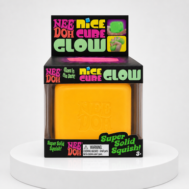 NeeDoh Nice Cube Glow yellow squishy fidget toy in retail packaging, front view.