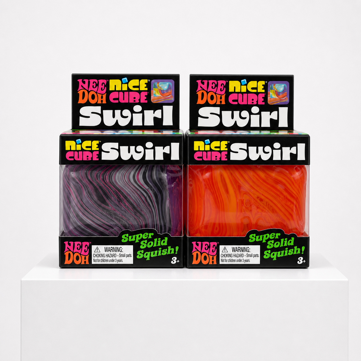 NeeDoh Nice Cube Swirl squishy fidget toys in orange and black, pink, and purple swirl packaging, front view.
