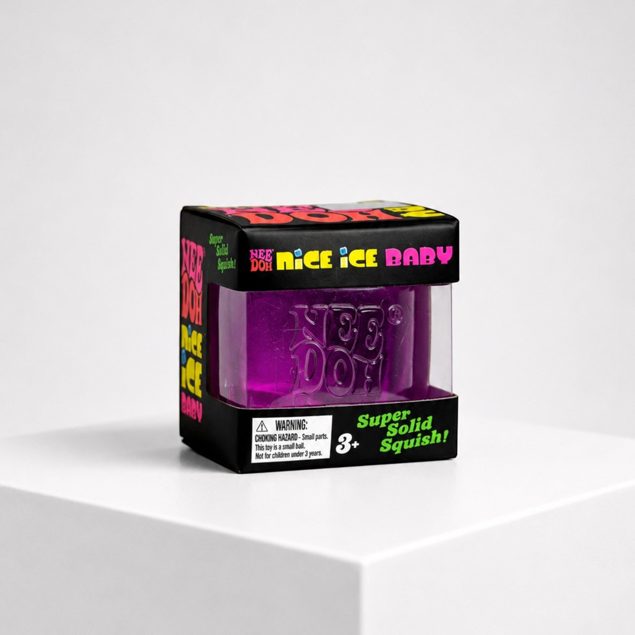 Squish Planet NeeDoh Nice Ice Baby purple squishy cube fidget toy in its black retail packaging box