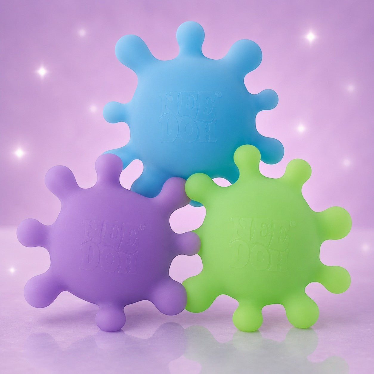 Squish Planet NeeDoh SplootSplat fidget toys in blue, purple, and green with a soft, squishy, star-like splat design.