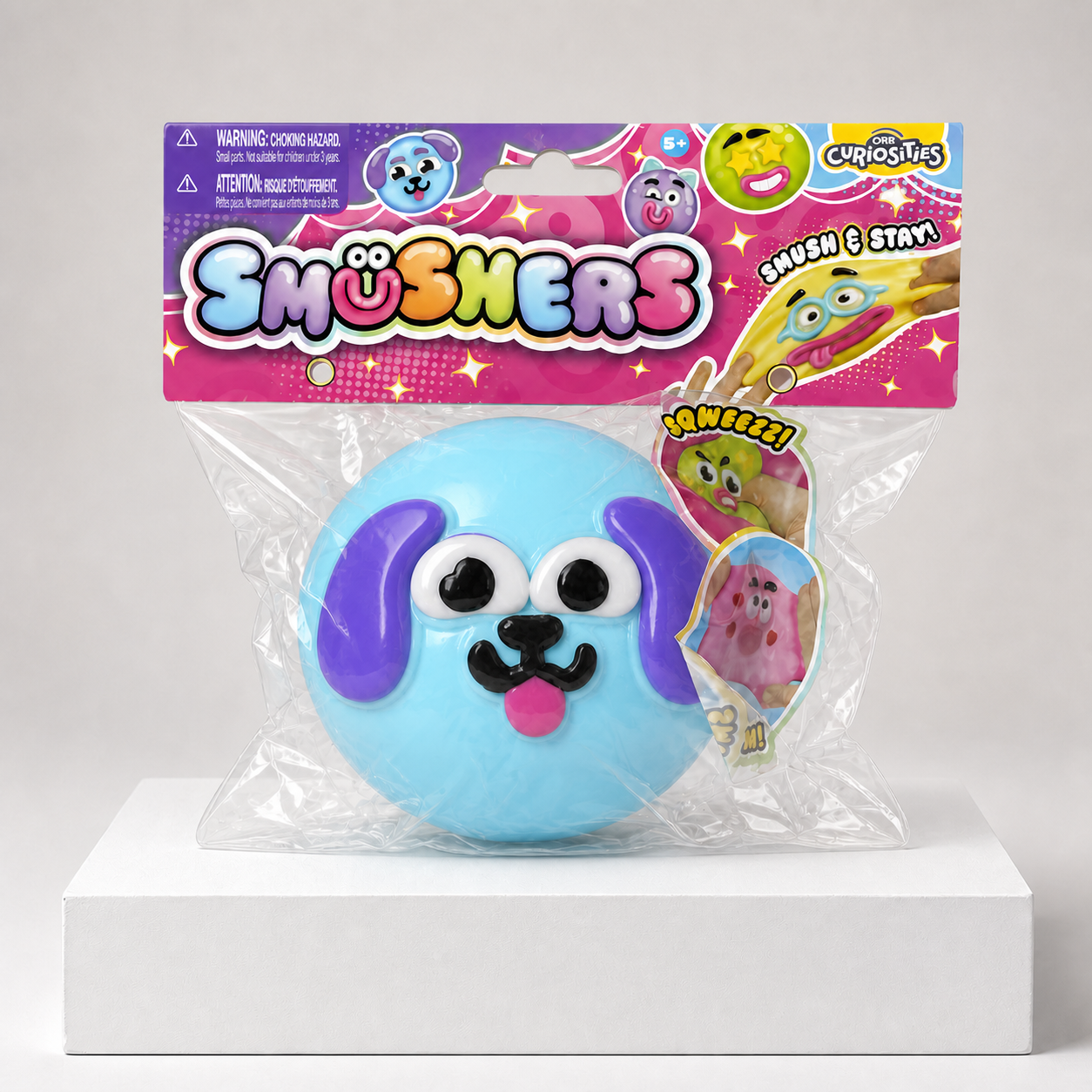 Blue Puppy ORB Curiosities Smushers Squishy Toy in centered retail packaging