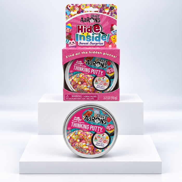 Crazy Aaron's Hide Inside Sweet Surprise Thinking Putty tin and pink display box, front view