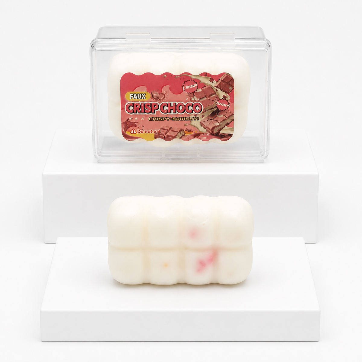 White Crisp Choco package with loose white segmented squish toy