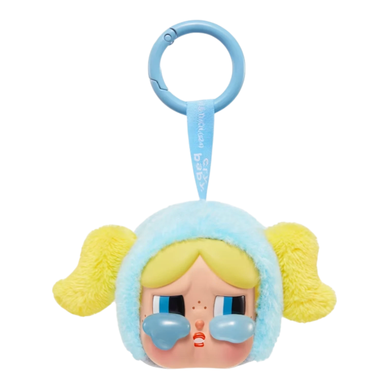 Squish Planet CryBaby x Powerpuff Girls plush toy with a vinyl face, crying blue tears, and yellow pigtails.