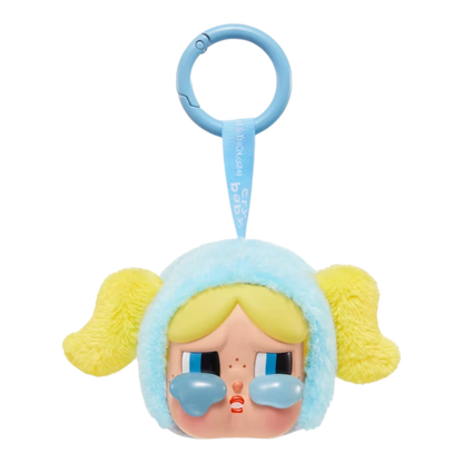 Squish Planet CryBaby x Powerpuff Girls plush toy with a vinyl face, crying blue tears, and yellow pigtails.