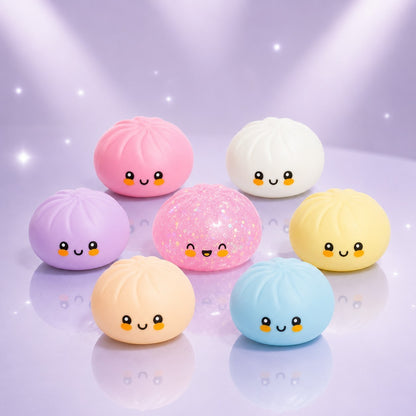 Squish Planet collection of colorful squishy dumpling toys with cute faces, featuring a pink holographic glitter chase.