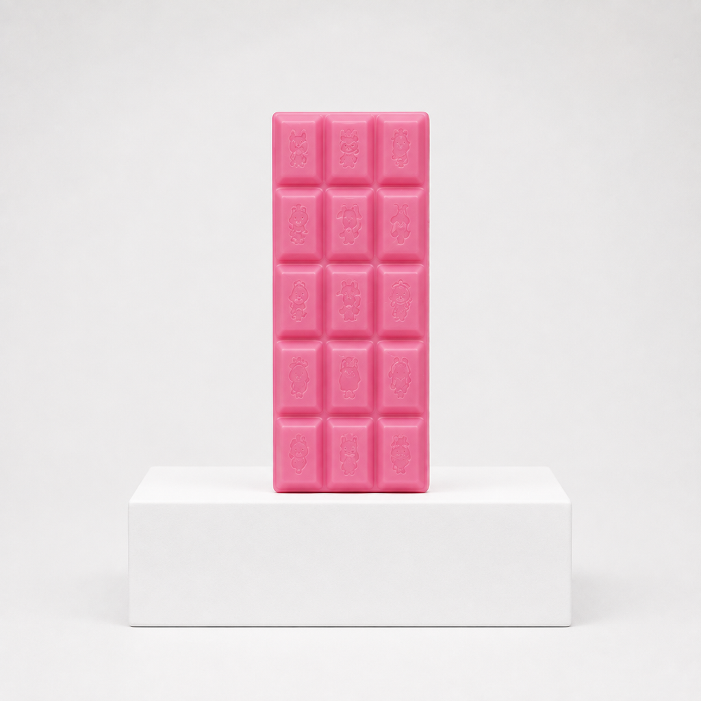Pink chocolate-bar squishy with embossed character designs